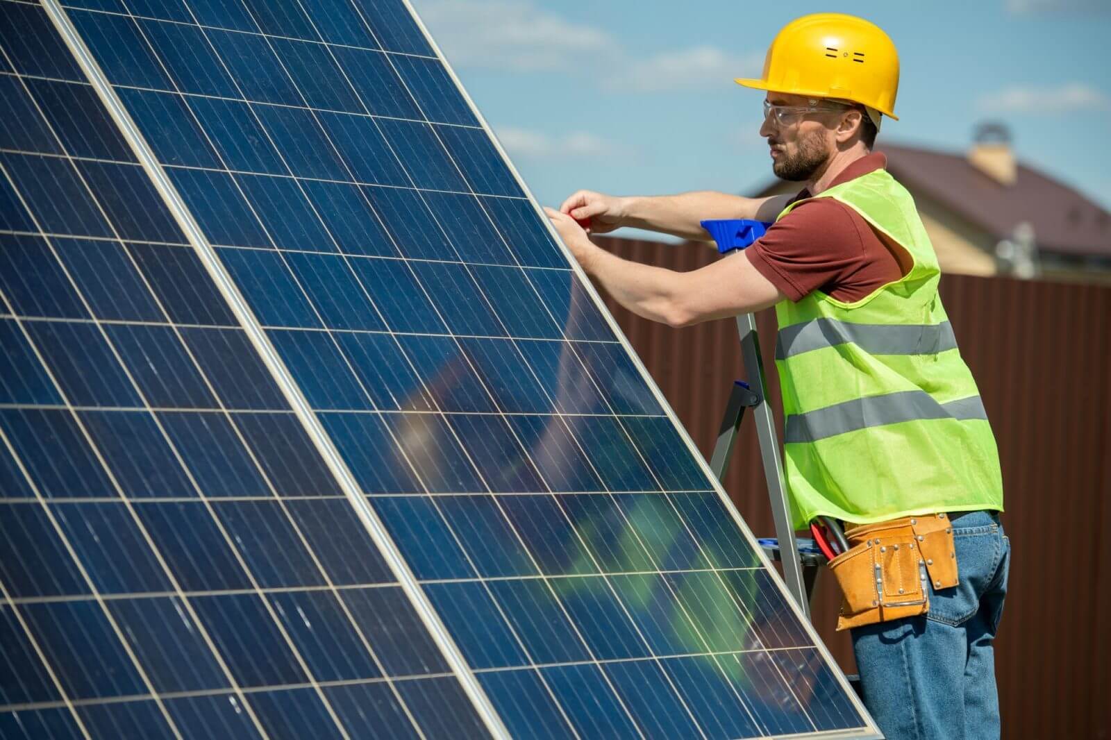 engineer-installing-solar-panel-min(1)